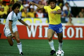 Brazil's Zico is chased by New Zealand's Adrian Elrick at the 1982 World Cup