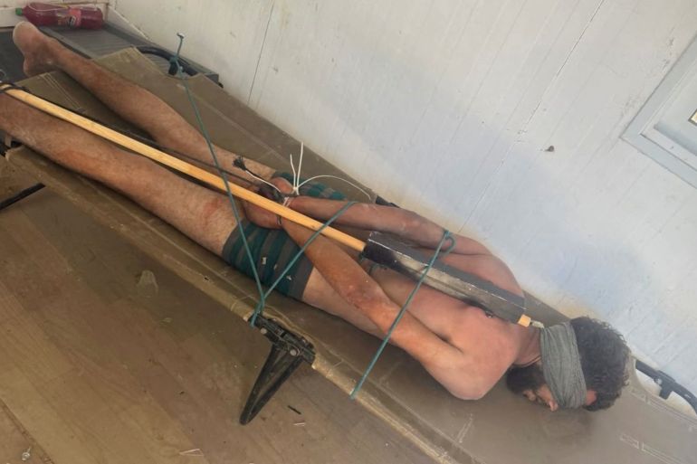 A Palestinian man from Gaza lies blindfolded, stripped to his underwear and restrained face down on a cot while in Israeli custody in this picture released June 30, 2026 and obtained by Reuters on July 4, 2026. SOCIAL MEDIA/via REUTERS THIS IMAGE HAS BEEN SUPPLIED BY A THIRD PARTY. NO RESALES. NO ARCHIVES. VERIFICATION: Reuters was not able to verify the location or date when the photo was taken, but no older versions of the photo were found posted online before June 30. Reuters was not able to verify the identity or welfare of the man in the photo, but the Israeli military said that the photo is authentic. TPX IMAGES OF THE DAY