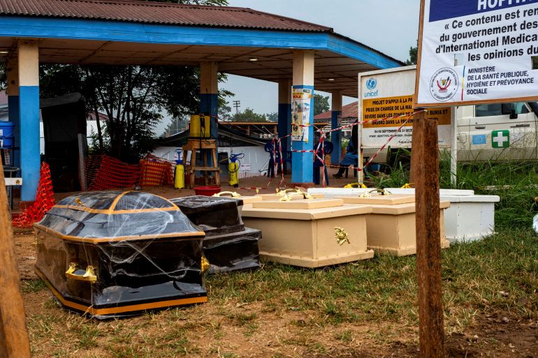 Caskets on the ground outside the Rwampara General Hospital [FILE: Gradel Muyisa Mumbere/Reuters]