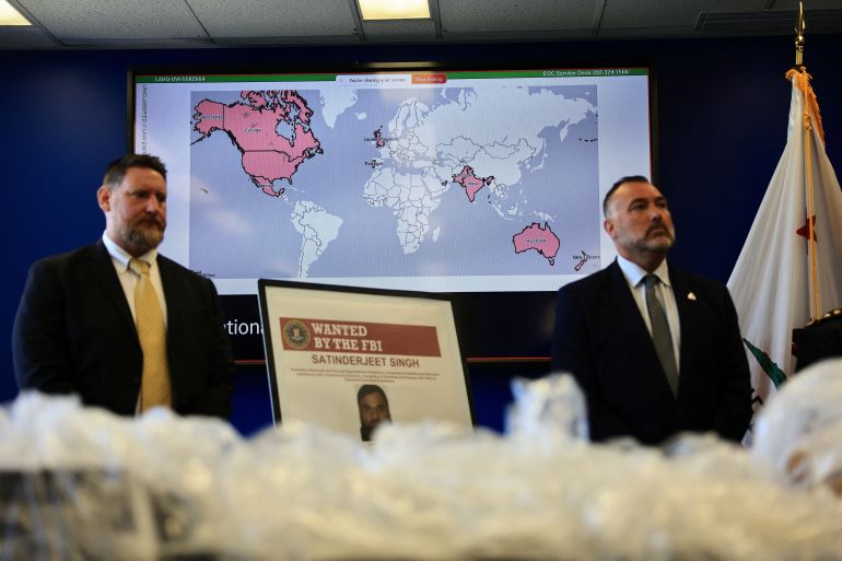 A screen displays a map, as U.S. and Canadian law enforcement officials announce federal charges and arrests of alleged members of a transnational organized crime group, at FBI offices in Los Angeles, California, U.S. July 7, 2026. REUTERS/David Swanson
