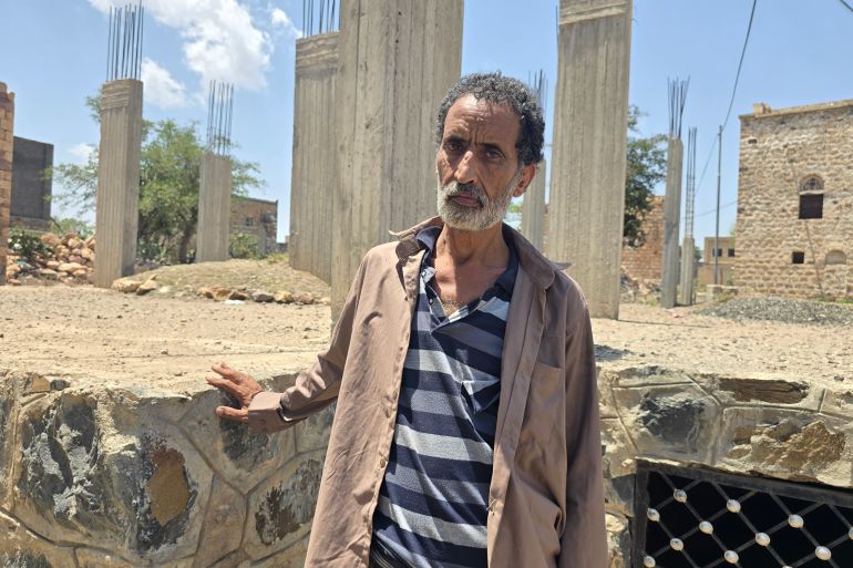 Ahmed Nagi, who is in his 50s, can barely walk without a cane and cannot access the medical care he needs [Nasser al-Sakkaf/Al Jazeera]