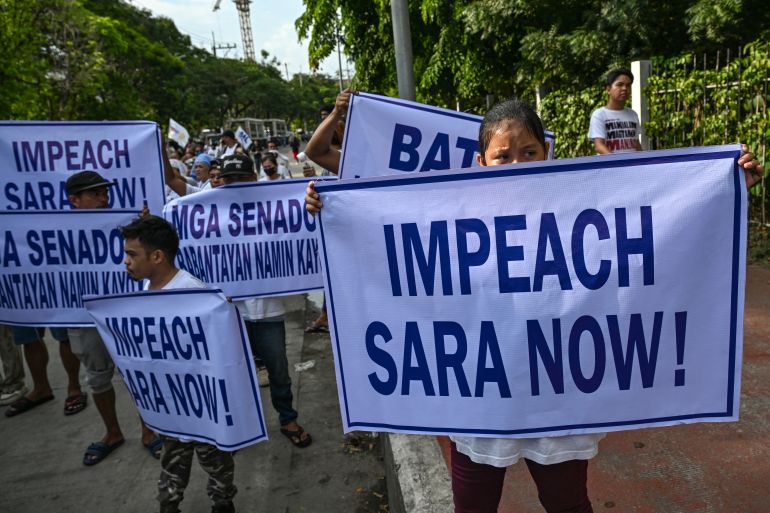 Protesters demand start of VP Sara Duterte impeachment trial outside Philippine Senate in Pasay, Metro Manila, in May 2026