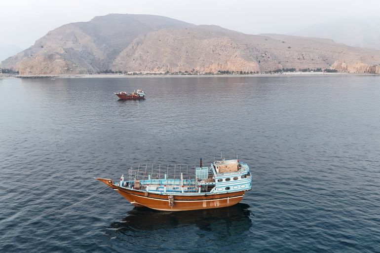 boats anchored off Oman’s northern Musandam Peninsula near the Strait of Hormuz