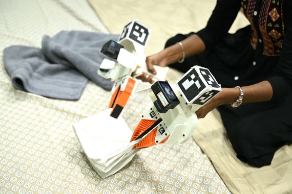The Indian workers training AI robots to take their jobs