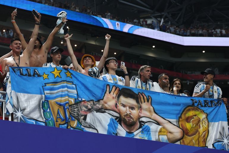 Argentina's fans celebrate their team's win against Egypt at Atlanta Stadium [Thomas Coex/AFP]