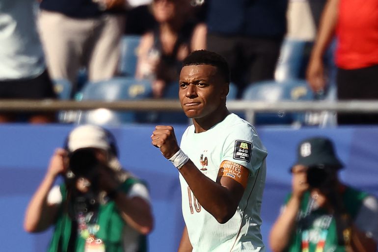Kylian Mbappe reacts.