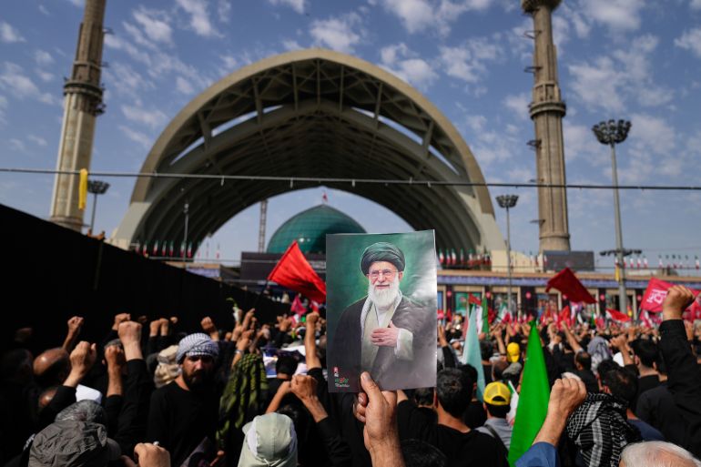 Millions mourn Khamenei in Tehran amid historic funeral procession.