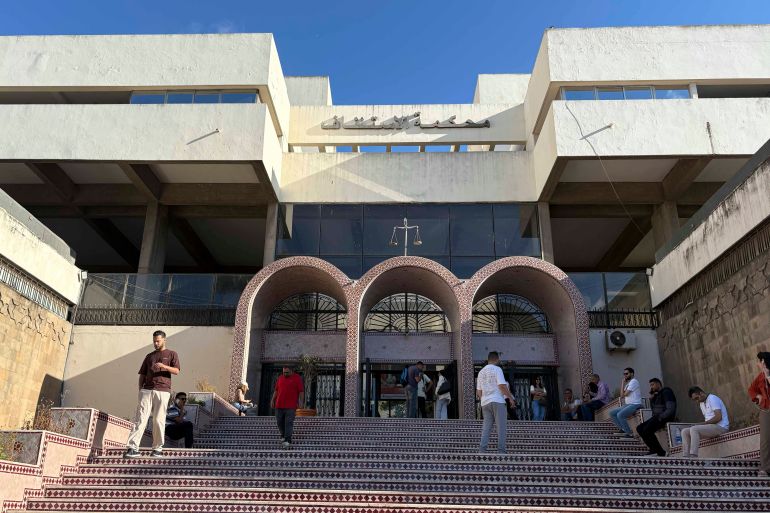 Family members wait outside the appeal court of Casablanca, Morocco, Thursday, June 25, 2026.(AP Photo/Akram Oubachir)