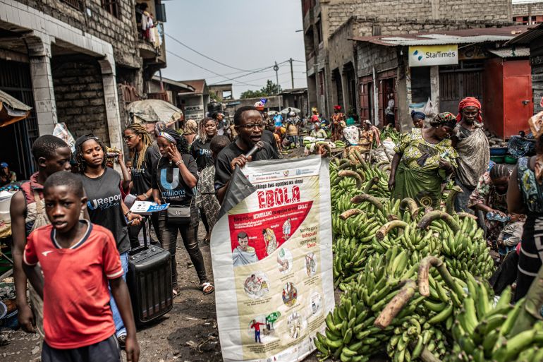 GOMA, DEMOCRATIC REPUBLIC OF CONGO - JUNE 24: Workers with UNICEF's 'U-Report' group raise awareness about Ebola transmission at Alanine market on June 24, 2026 in Goma, Democratic Republic of Congo. On Monday, UN agencies announced that Ebola cases in the Democratic Republic of Congo had surpassed 1,000. Although testing capacity has recently improved, surveillance and contact tracing remain constrained by insecurity and restricted access in Ituri province, the heart of the current outbreak, north of Goma. (Photo by Daniel Buuma/Getty Images)