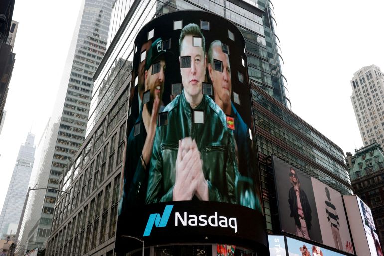 FILE PHOTO: A live feed shows SpaceX CEO Elon Musk on the day of SpaceX's initial public offering (IPO) at the Nasdaq MarketSite, in New York City, U.S., June 12, 2026. REUTERS/Jeenah Moon/File Photo